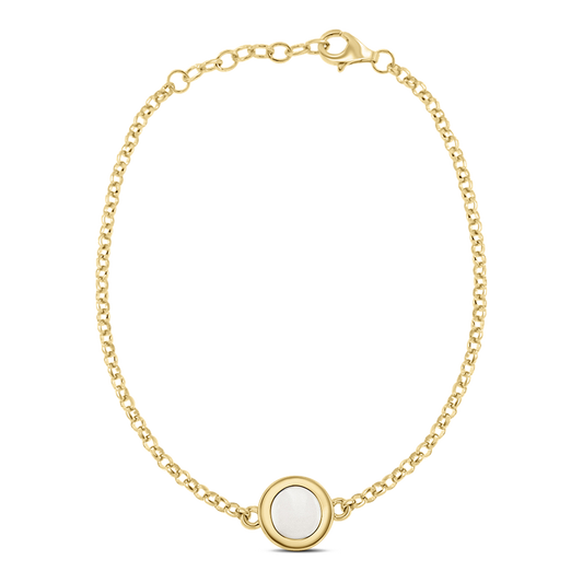 Goldenes Armband mit einer runden, weißen Muttermilch-Kunstharzfläche in einer goldenen Fassung.